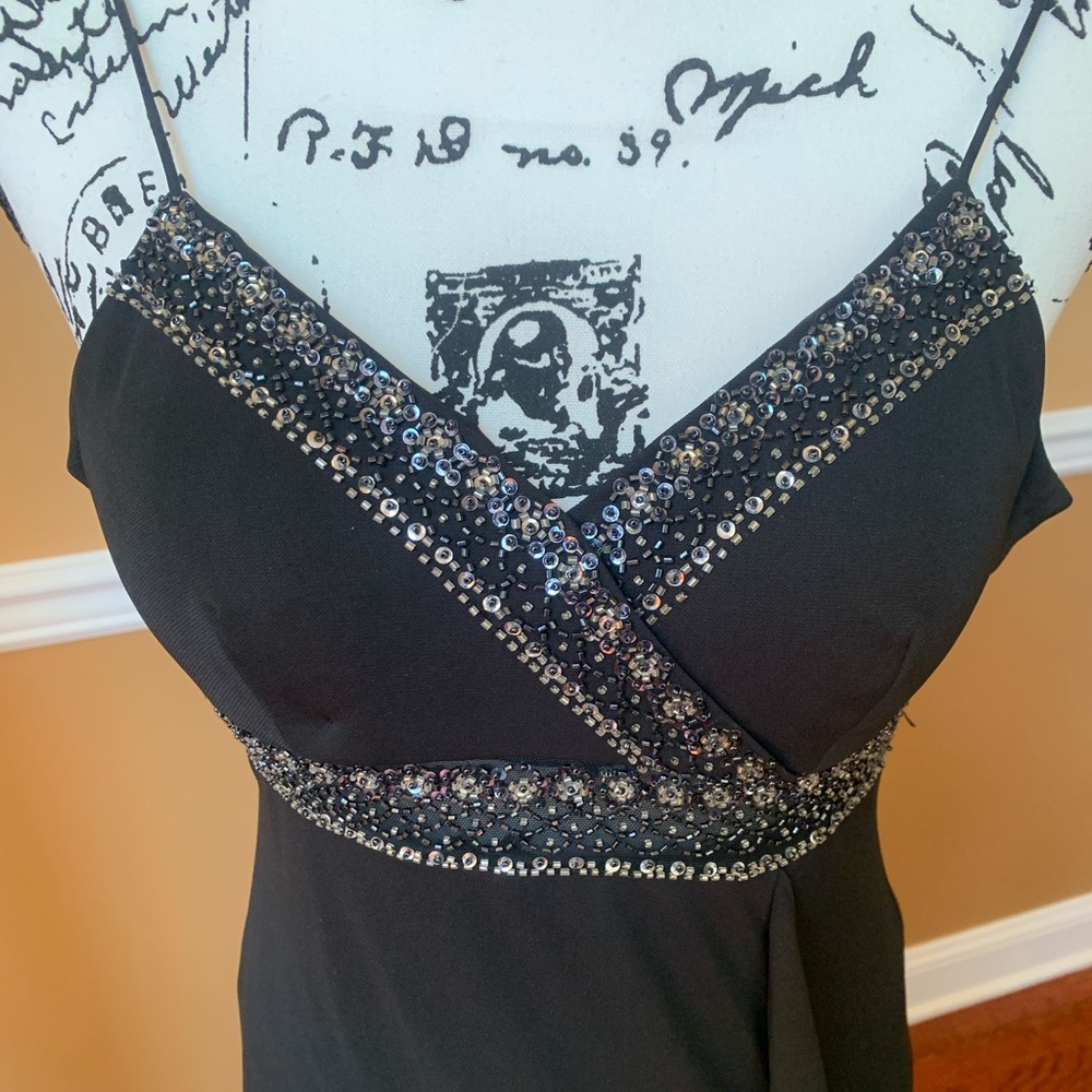 VINTAGE BUGLE BEADED SEQUIN AND EMPIRE WAISTLINE.